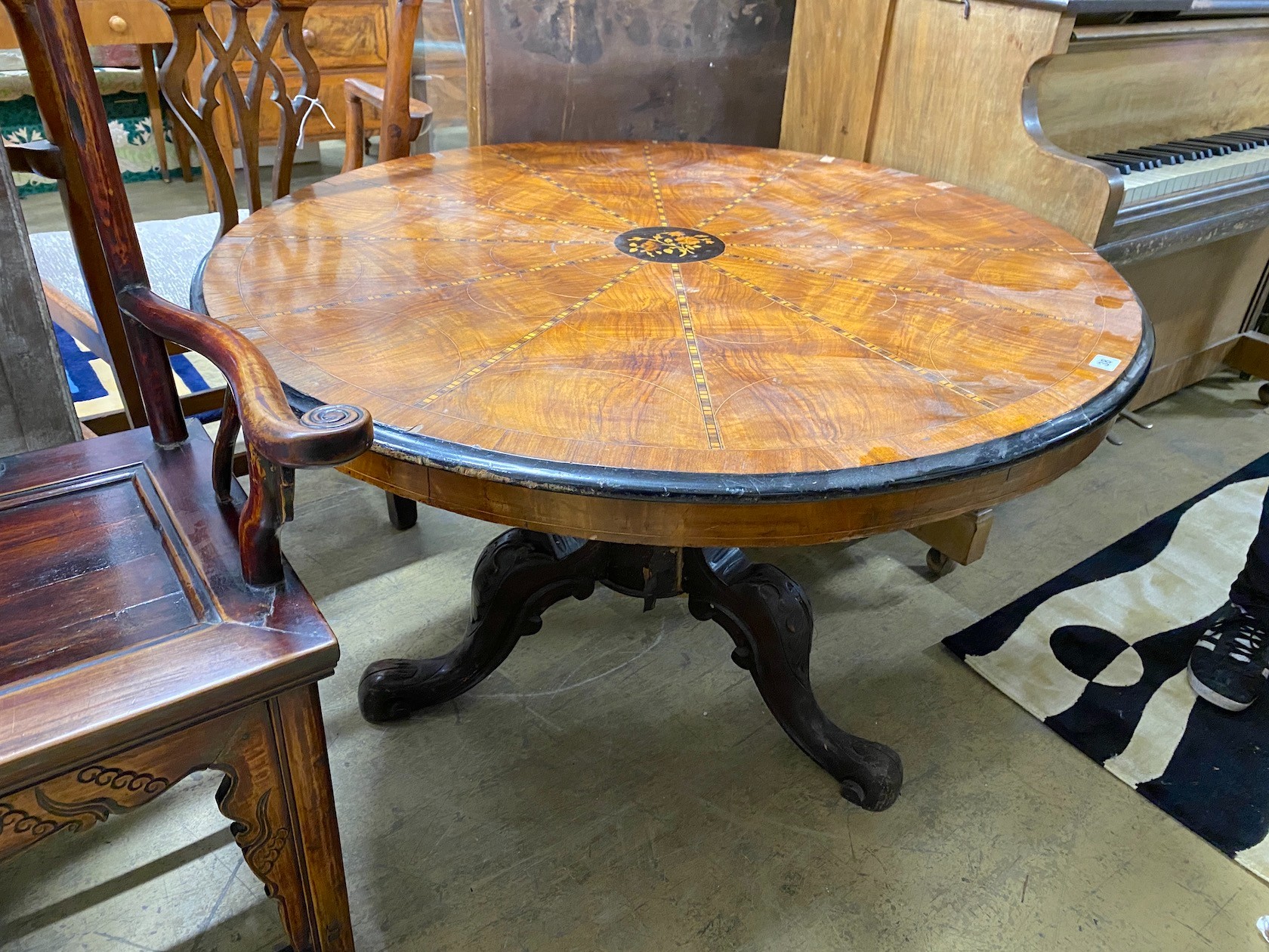 A 19th century inlaid walnut breakfast / centre table (in need of restoration), diameter 110cm, height 68cm